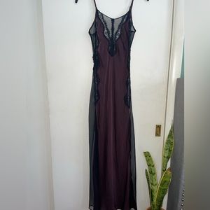 Sleeveless dress with lace at the top and mesh on the sides size small